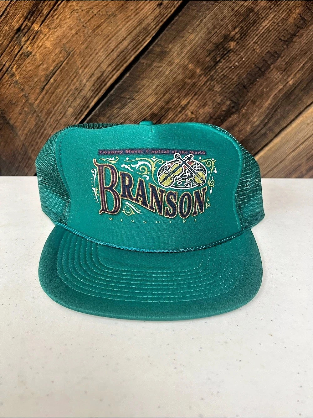 Branson Trucker Hat in Green Like New
